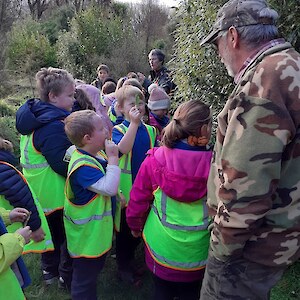 Wyndham Primary School Year 3 Class hear about the restoration plantings in the lower wetland area from Alan Leitch. June 2021.