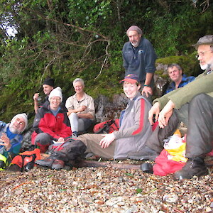 Volunteers take a well earned rest at end of the day. 2006.