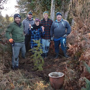 2022 September. Fonterra staff assist with a working bee - planting, potting up seedlings from bush and gorse control. Totara planted here donated from Edendale garden.