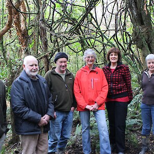 Sam Gibson (at the very left) from Goodnature explaining about the Goodnature traps the Trust wants to use to eradicate pests in the forest. Trust members - from left to right - are Malcolm Mackenzie, Ken White, Agnes Irwin, Glenys Dickson, Jan Riddell.