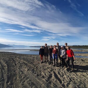 Meridian staff at the mouth of the river after a working bee checking traps.