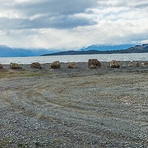 Rocks placed around the car park to discourage bikes and 4wd vehicles from travelling on to the nesting areas. There are also signs explaining why this area is so special and the need to protect it in this way.